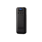 Close-up of a mini hidden security camera showing its discreet, compact design with matte black finish against a neutral background.